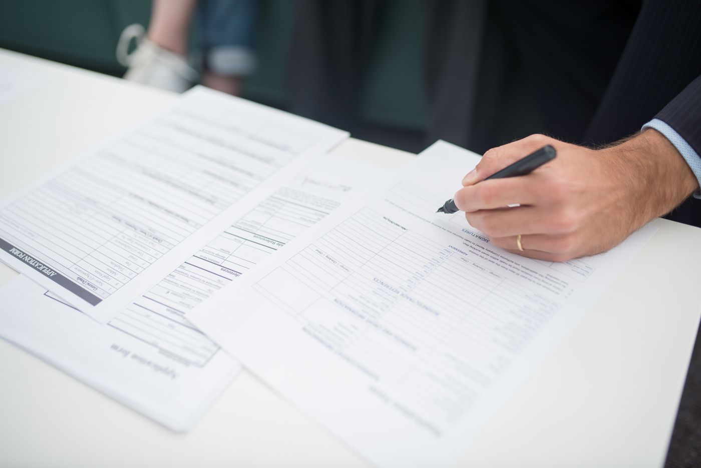 Illustrative insurance paperwork review and signing